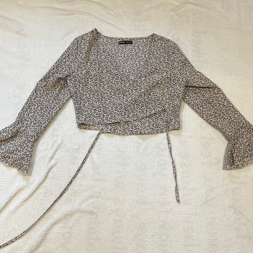 Light and airy cropped wraparound long sleeve shirt